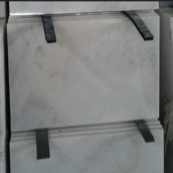 white honed marble tile